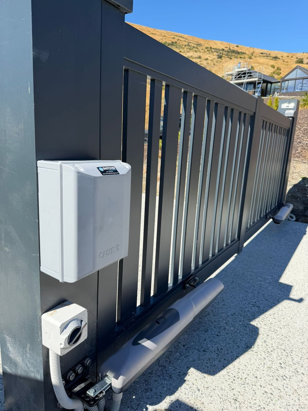 Automatic sliding gate with CAME motor and controller installed by Shotover Fencing Solutions, Queenstown
