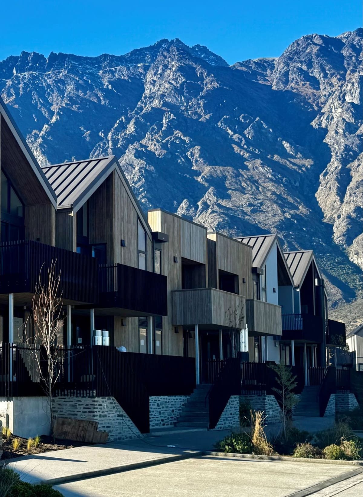Row of townhouse balustrades below The Remarkables, Queenstown