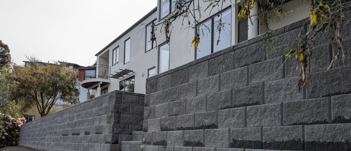 Concrete block retaining wall on a Queenstown section