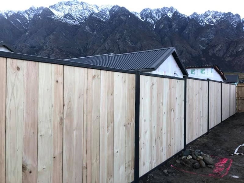 Smart wall fencing with a black frame and The Remarkables behind, Queenstown